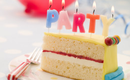 Party Candles on a Slice of Birthday Cake